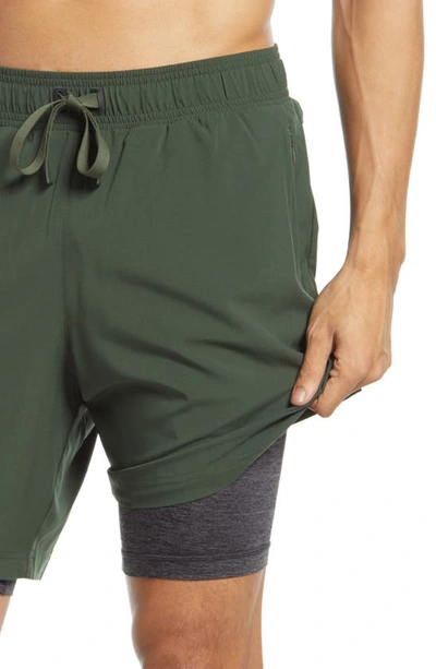 Shop Alo Yoga Unity 2-in-1 Shorts In Hunter