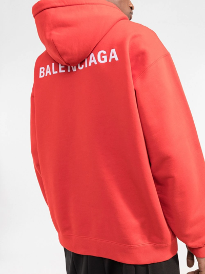Shop Balenciaga Logo Drawstring Hoodie In Rot