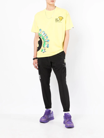 Shop Aape By A Bathing Ape Graphic Print T-shirt In Gelb