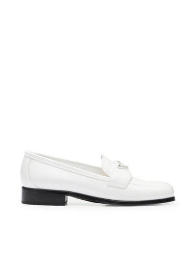 Shop Prada Brushed Leather Loafers In White