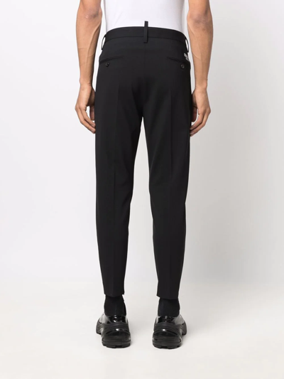 Shop Dsquared2 Cropped Tapered-leg Trousers In Black