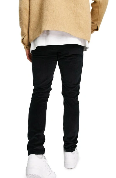 Shop Asos Design Stretch Skinny Fit Corduroy Pants In Black