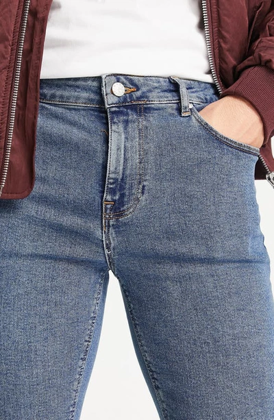 Shop Asos Design Skinny Fit Stretch Jeans In Medium Blue