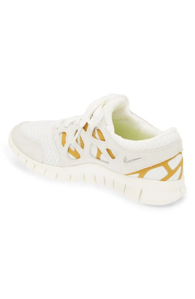 Shop Nike Free Run 2 Sneaker In Summit White/ Orange/ Gold