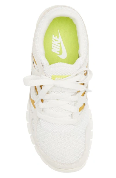 Shop Nike Free Run 2 Sneaker In Summit White/ Orange/ Gold
