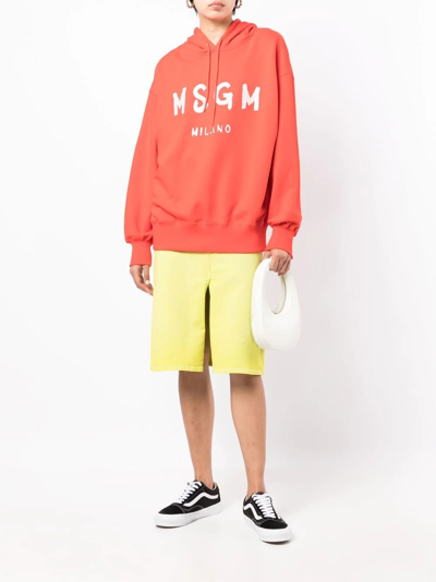 Shop Msgm Logo-print Hoodie In 橘色