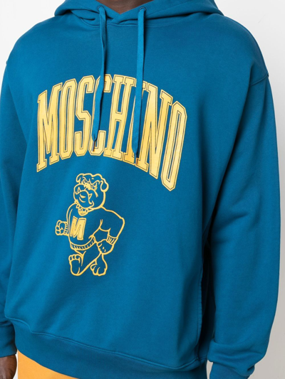 Shop Moschino Logo Drawstring Hoodie In Blue