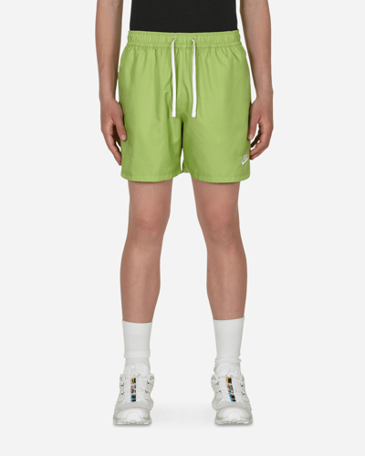 Shop Nike Flow Woven Shorts Green In Multicolor
