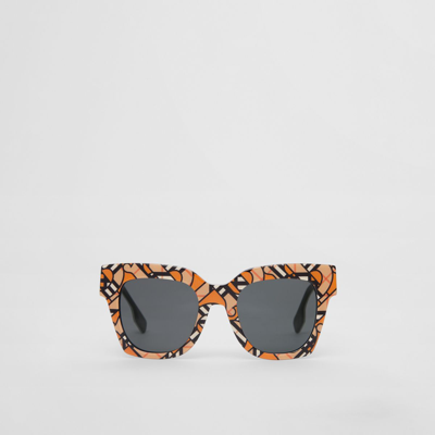 Shop Burberry Monogram Print Square Frame Sunglasses In Orange/black