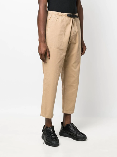 Shop Gramicci Belted-waist Cropped Trousers In Neutrals