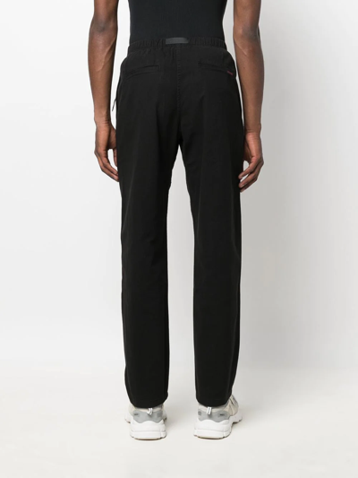 Shop Gramicci Belted-waist Straight-leg Trousers In Black