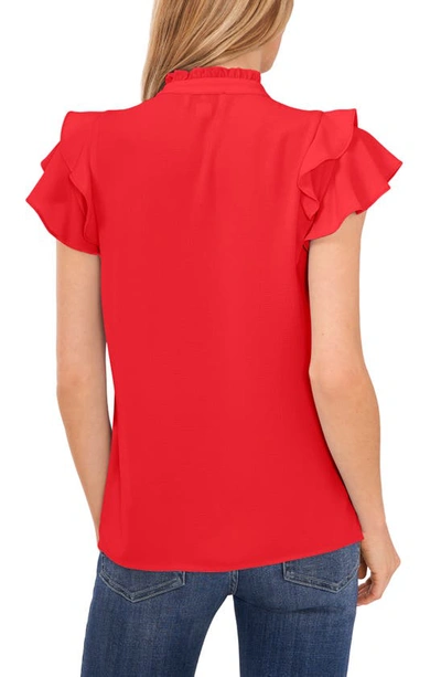 Shop Cece Pintuck Ruffle Short Sleeve Blouse In Fireball Red