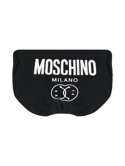 Shop Moschino Logo Swim Trunks In Black
