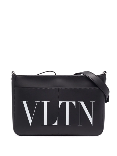 Shop Valentino Logo-print Messenger Bag In Black