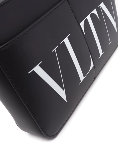 Shop Valentino Logo-print Messenger Bag In Black
