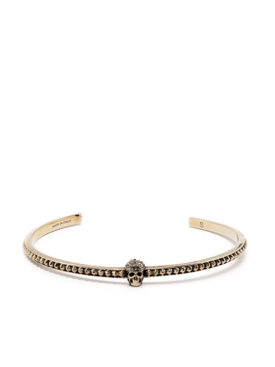 Shop Alexander Mcqueen Skull Charm Cuff Bracelet In Gold