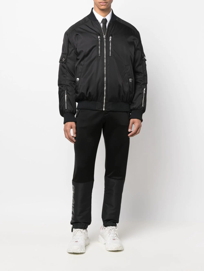 Alexander Mcqueen Panelled Tapered Track Pants In Black
