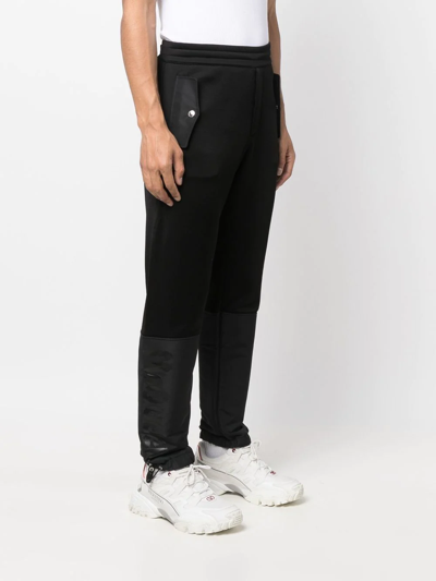 Shop Alexander Mcqueen Panelled Tapered Track Pants In Black