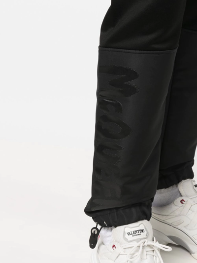 Shop Alexander Mcqueen Panelled Tapered Track Pants In Black