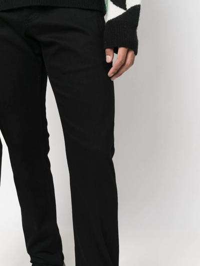 Shop Alexander Mcqueen Zip-pocket Detail Trousers In Black