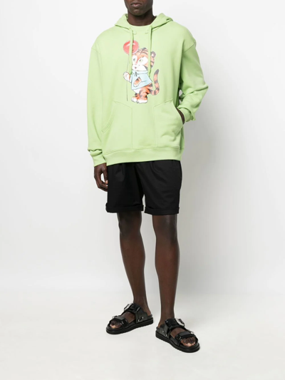 Shop Moschino Graphic Print Drawstring Hoodie In Green