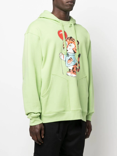 Shop Moschino Graphic Print Drawstring Hoodie In Green