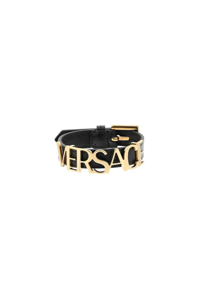 Shop Versace Logo Lettering Buckle Bracelet In Black
