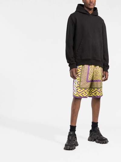 Shop Versace La Greca-print Silk Shorts In Yellow