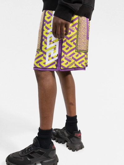 Shop Versace La Greca-print Silk Shorts In Yellow