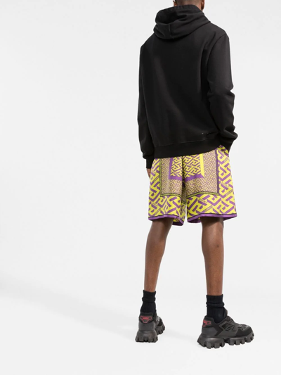 Shop Versace La Greca-print Silk Shorts In Yellow