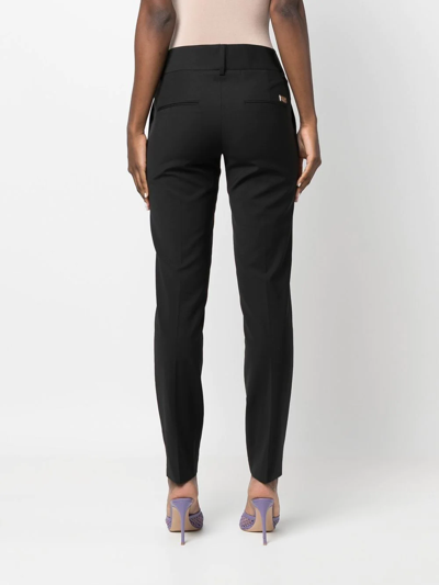 Shop Philipp Plein Tapered Wool-blend Trousers In Black