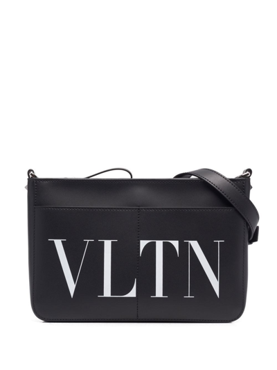 Shop Valentino Logo Cross Body Bag In Black