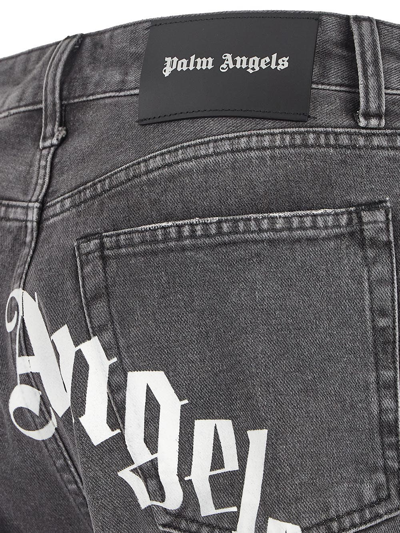 Shop Palm Angels Back Logo Jeans In Grey