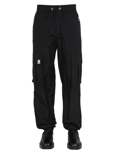 Shop Balmain Logo Patch Drawstring Track Pants In Black