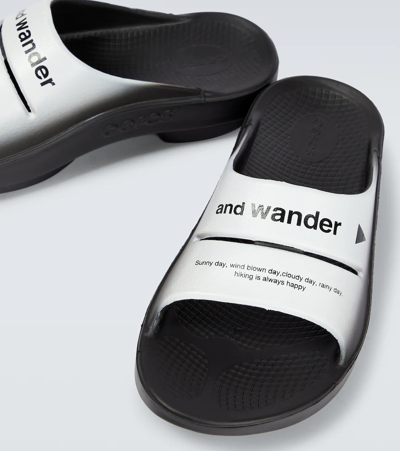 Shop And Wander X Oofos Ooahh Rubber Slides In Black