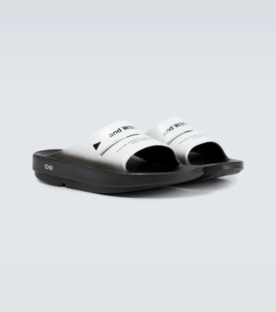 Shop And Wander X Oofos Ooahh Rubber Slides In Black