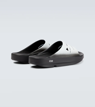 Shop And Wander X Oofos Ooahh Rubber Slides In Black