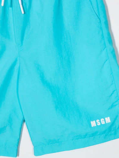 Shop Msgm Teen Logo-print Swim Shorts In Blue