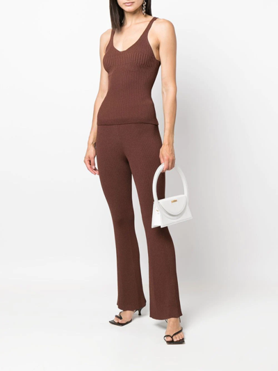 Shop Aeron Ribbed-knit Flared Trousers In Brown