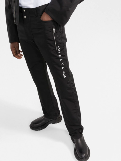 Shop Alyx Logo-print Straight-leg Trousers In Black