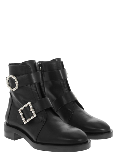 Shop Stuart Weitzman Ryder Pearl Geo - Ankle Boot With Buckles In Black