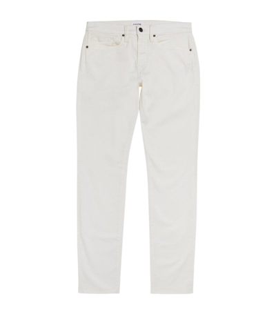 Shop Frame L'homme Slim Jeans In White