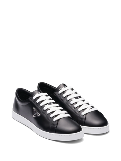 Shop Prada Logo-plaque Low-top Sneakers In Black