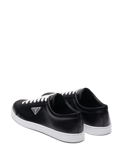 Shop Prada Logo-plaque Low-top Sneakers In Black