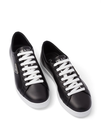 Shop Prada Logo-plaque Low-top Sneakers In Black