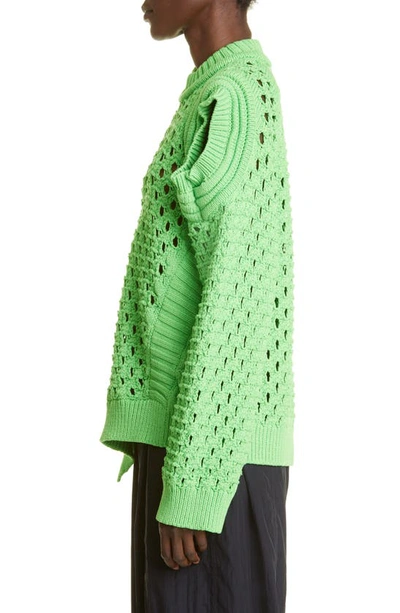 Shop Stella Mccartney Big Stitch Asymmetric Cotton Blend Sweater In 3801 Green Fluo