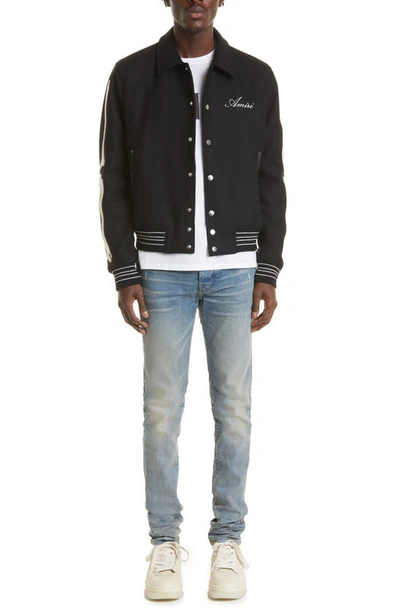 Shop Amiri Bones Wool Varsity Jacket In Black