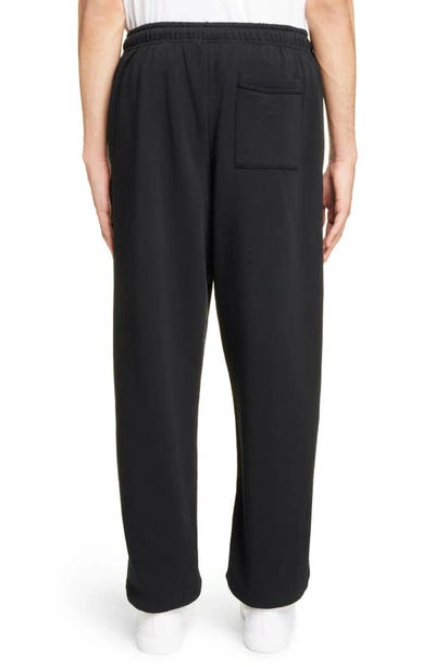 Shop Acne Studios Face Patch Cotton Fleece Sweatpants In Black