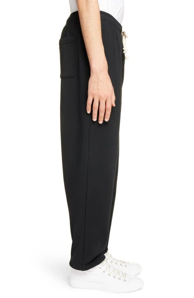 Shop Acne Studios Face Patch Cotton Fleece Sweatpants In Black