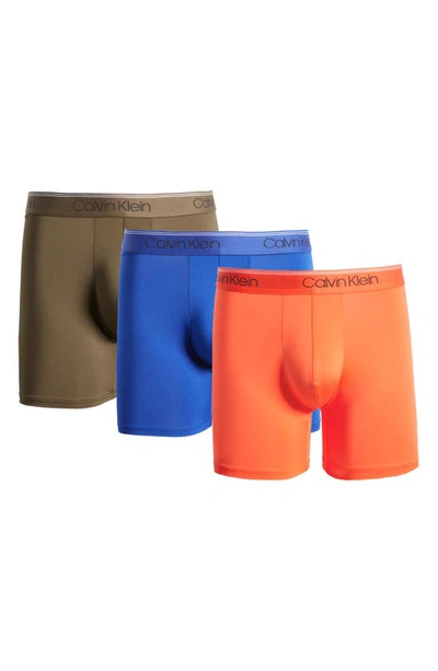 Shop Calvin Klein 3-pack Low Rise Microfiber Stretch Boxer Briefs In Orange/ Blue/ Olive